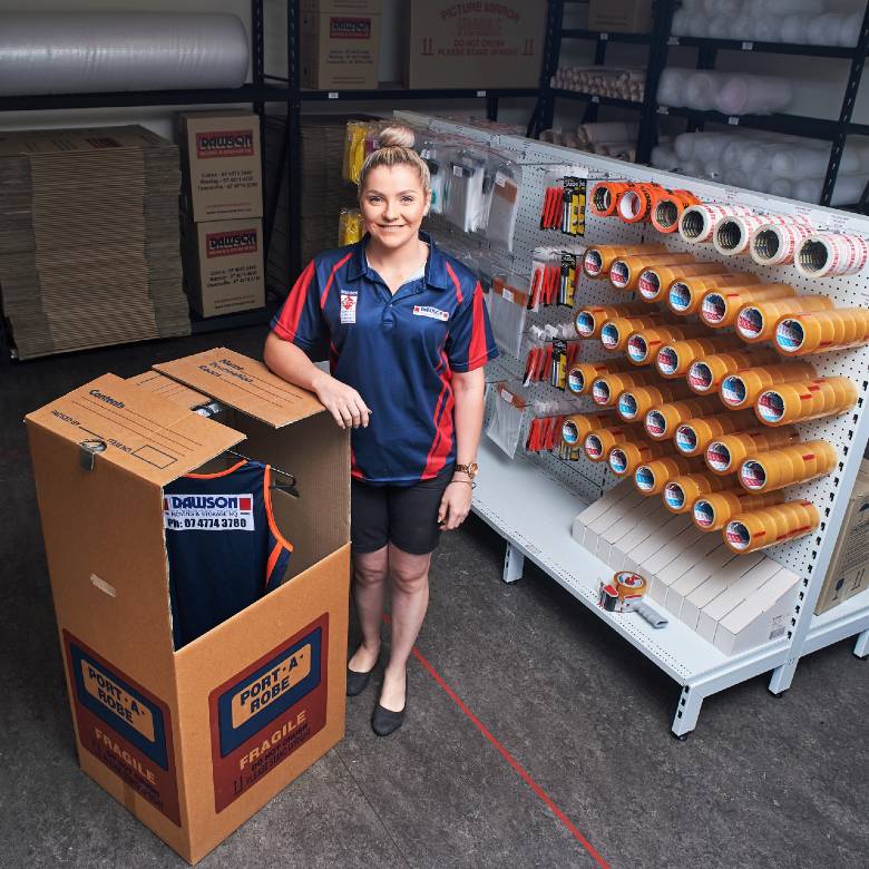 Dawson Moving & Storage NQ employee with packaging